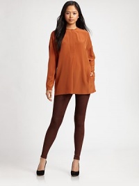Fluid silk in a boyfriend-inspired silhouette with a jewelneck, button front and dropped shoulders. JewelneckButton closureDropped shouldersLong sleevesButtoned cuffsLonger length hits below the hipsSilkDry cleanImportedModel shown is 5'10 (177cm) wearing US size Small. Fluid silk in a boyfriend-inspired silhouette with a jewelneck, button front and dropped shoulders. JewelneckButton closureDropped shouldersLong sleevesButtoned cuffsLonger length hits below the hipsSilkDry cleanImportedModel shown is 5'10 (177cm) wearing US size Small.