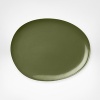 Borrowing from nature, this Pebblestone platter is metaphorically contoured and highly glossed in straightforward colors. The silhouette, a DVF signature, makes tables shine. Create interesting contrasts or pair with perfect matches.