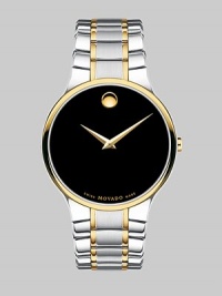 Two-tone stainless steel in a sleek, understated design.Swiss quartz movement Water resistant to 3 ATM Stainless steel case, 38mm (1½) Black Museum dial Round marker at 12 o'clock Made in Switzerland Two-tone stainless steel in a sleek, understated design.Swiss quartz movement Water resistant to 3 ATM Stainless steel case, 38mm (1½) Black Museum dial Round marker at 12 o'clock Made in Switzerland