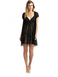 THE LOOKSemi-sheer designDeep v-neckCap dolman sleevesSingle front button closureCascading ruffle openingSelf-tie beltTHE FITAbout 33 from shoulder to hemTHE MATERIALPolyester/rayonCARE & ORIGINMachine washImportedModel shown is 5'9 (175cm) wearing US size Small. THE LOOKSemi-sheer designDeep v-neckCap dolman sleevesSingle front button closureCascading ruffle openingSelf-tie beltTHE FITAbout 33 from shoulder to hemTHE MATERIALPolyester/rayonCARE & ORIGINMachine washImportedModel shown is 5'9 (175cm) wearing US size Small.