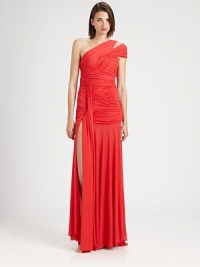 Brightly-hued chiffon jersey, tailored with elegant ruching and a flattering criss-cross construction.Asymmetrical necklineSingle cap sleeve with split shoulderRuched criss-cross bodiceSide slitFully linedAbout 42 from natural waistAcetate/nylonDry cleanImportedModel shown is 5'11 (180cm) wearing US size Small. Brightly-hued chiffon jersey, tailored with elegant ruching and a flattering criss-cross construction.Asymmetrical necklineSingle cap sleeve with split shoulderRuched criss-cross bodiceSide slitFully linedAbout 42 from natural waistAcetate/nylonDry cleanImportedModel shown is 5'11 (180cm) wearing US size Small.