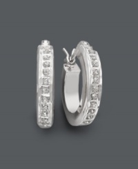 Add sparkle and shine in an instant. A classic hoop setting shines with the addition of sparkling diamond accents. Crafted in sterling silver. Approximate diameter: 1-1/4 inches. Add sparkle and shine in an instant. A classic hoop setting shines with the addition of sparkling diamond accents. Crafted in sterling silver. Approximate diameter: 1-1/4 inches.