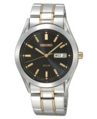 Solar flair: Seiko's stylish watch runs on solar power. Two tone stainless steel bracelet and round case, 36mm. Black dial with godltone hands and stick indices and day/date window. Ten-month energy storage. Quick-start function and energy depletion warning. Water resistant to 30 meters. Three-year limited warranty. Solar flair: Seiko's stylish watch runs on solar power. Two tone stainless steel bracelet and round case, 36mm. Black dial with godltone hands and stick indices and day/date window. Ten-month energy storage. Quick-start function and energy depletion warning. Water resistant to 30 meters. Three-year limited warranty.