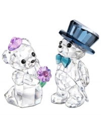 Romance is in the air for Kris Bear. A radiant bride with a violet bouquet and groom wearing a top hat and tails make this Swarovski duo a cute gift for the happy couple. Romance is in the air for Kris Bear. A radiant bride with a violet bouquet and groom wearing a top hat and tails make this Swarovski duo a cute gift for the happy couple.