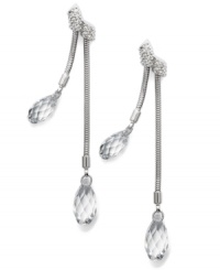 Drops of soothing crystals adorn these radiant earrings from Swarovski. Briolette-cut clear crystals shine on snake chains. Crafted in rhodium-plated mixed metal. Approximate drop: 2-1/2 inches. Drops of soothing crystals adorn these radiant earrings from Swarovski. Briolette-cut clear crystals shine on snake chains. Crafted in rhodium-plated mixed metal. Approximate drop: 2-1/2 inches.