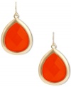 Drops of summer. These colorful drop earrings feature faceted orange acrylic beads in a teardrop design, framed in a gold tone mixed metal setting. Approximate drop: 1-1/2 inches.