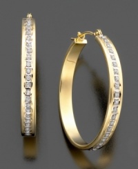 Bold style with a sparkling center. Diamond-accent hoop earrings in 14k gold. Approximate diameter: 1 inch. Bold style with a sparkling center. Diamond-accent hoop earrings in 14k gold. Approximate diameter: 1 inch.