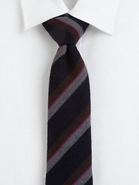A brilliant take on classic stripes, a fine silk tie that offers unquestionable charm.SilkDry cleanMade in Italy A brilliant take on classic stripes, a fine silk tie that offers unquestionable charm.SilkDry cleanMade in Italy