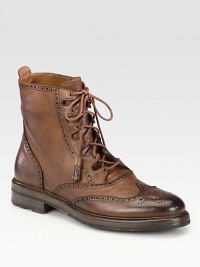 Distressed, country grain leather wingtip boot with perforated detailing for a heritage-inspired feel.Leather upperLeather liningPadded insoleRubber soleImportedOUR FIT MODEL RECOMMENDS ordering true size. Distressed, country grain leather wingtip boot with perforated detailing for a heritage-inspired feel.Leather upperLeather liningPadded insoleRubber soleImportedOUR FIT MODEL RECOMMENDS ordering true size.