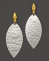 A simply elegant drop from Gurhan, this leaf earring is crafted from hammered white silver, with 24 Kt. yellow gold posts.