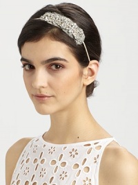 This crystal embellished design is sure to add sparkle to any look. Swarovski crystalsSilk chiffonSteel baseMade in the USA This crystal embellished design is sure to add sparkle to any look. Swarovski crystalsSilk chiffonSteel baseMade in the USA