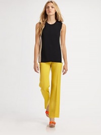 This minimal colorblocked style is enhanced by a modern, tucked take on a bustle in back.Jewel necklineSleevelessContrast side panelsVented hemlineTucked back bustle detailConcealed back zipDry cleanMade in Italy of imported fabricModel shown is 5'11 (180cm) wearing US size 4. This minimal colorblocked style is enhanced by a modern, tucked take on a bustle in back.Jewel necklineSleevelessContrast side panelsVented hemlineTucked back bustle detailConcealed back zipDry cleanMade in Italy of imported fabricModel shown is 5'11 (180cm) wearing US size 4.