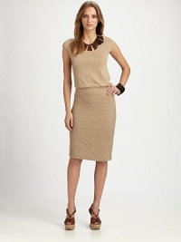 A soft, smooth bodice leads to a flattering drop waist and a textured skirt for a flirty touch.ScoopneckCap sleevesBanded drop waistTextured skirtGathered details at backAbout 38 from shoulder to hem55% rayon/45% nylonDry cleanImported Model shown is 5'10½ (179cm) wearing US size Small. A soft, smooth bodice leads to a flattering drop waist and a textured skirt for a flirty touch.ScoopneckCap sleevesBanded drop waistTextured skirtGathered details at backAbout 38 from shoulder to hem55% rayon/45% nylonDry cleanImported Model shown is 5'10½ (179cm) wearing US size Small.