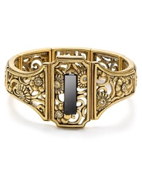 A showpiece from T Tahari, this bold cuff brings Deco-inspire decadence to your look, cast in plated metal with stone detailing.