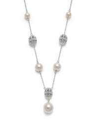 Style worth flaunting. This intricate pendant from Eliot Danori boasts filigree crystal balls and shimmering simulated pearls (6 mm). Setting crafted from rhodium-plated mixed metal. Approximate length: 16 inches + 2-inch extender. Approximate drop: 3/4 inch. Style worth flaunting. This intricate pendant from Eliot Danori boasts filigree crystal balls and shimmering simulated pearls (6 mm). Setting crafted from rhodium-plated mixed metal. Approximate length: 16 inches + 2-inch extender. Approximate drop: 3/4 inch.