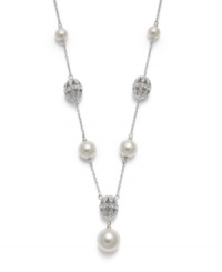 Style worth flaunting. This intricate pendant from Eliot Danori boasts filigree crystal balls and shimmering simulated pearls (6 mm). Setting crafted from rhodium-plated mixed metal. Approximate length: 16 inches + 2-inch extender. Approximate drop: 3/4 inch.