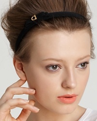 Go for a polished look with the perfect accessory, a thin grosgrain headband featuring Ferragamo's signature bow and logo accent. Go for a polished look with the perfect accessory, a thin grosgrain headband featuring Ferragamo's signature bow and logo accent.
