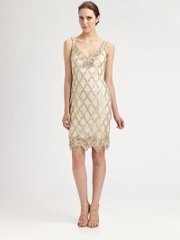 This romantic beaded design has a decidedly vintage sensibility.V necklineSleevelessScalloped hemlineLow V backConcealed side zipFully linedAbout 22 from natural waistNylonSpot cleanImportedModel shown is 5'10 (177cm) wearing US size 4. This romantic beaded design has a decidedly vintage sensibility.V necklineSleevelessScalloped hemlineLow V backConcealed side zipFully linedAbout 22 from natural waistNylonSpot cleanImportedModel shown is 5'10 (177cm) wearing US size 4.