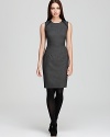 Faux-leather embellishment injects a classic Calvin Klein sheath dress with sophisticated edge. Elevate the silhouette with sheer tights and sleek heels for a thoroughly modern look.