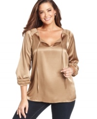 Indulge in the casual elegance of Jones New York Signature's plus size peasant top. Indulge in the casual elegance of Jones New York Signature's plus size peasant top.