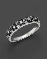 Black and white diamonds set in 14K. white gold. Black and white diamonds set in 14K. white gold.