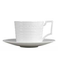 Steeped in history, the Intaglio teacup from Wedgwood features modern bone china embossed with geometric motifs from the Georgian era. With a distinct handle design. Steeped in history, the Intaglio teacup from Wedgwood features modern bone china embossed with geometric motifs from the Georgian era. With a distinct handle design.