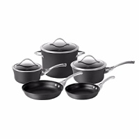 With a unique hard anodized shape, this Calphalon 8-piece cookware set features oversized pieces that have a capacity indicator line on the rim of the pan, making it easy to bring food from the kitchen to the table. Durable nonstick interior is perfect for healthy cooking with little to no fat. Cookware sets cannot be gift wrapped.