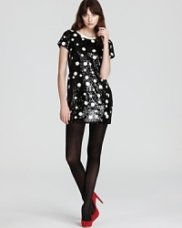 A modern rendition of polka dots, this Juicy Couture dress shines with oversized sequin pailettes for chic luster.