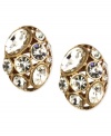 A tiny treasure from Jones New York. These button earrings add big sparkle with clear stones on a golden base. Crafted in worn gold tone mixed metal. Approximate diameter: 1/2 inch.