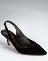 Jean-Michel Cazabat reinvents the classic kitten heel in a slingback silhouette and smooth black suede.