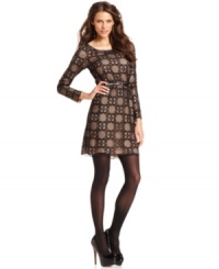 An intriguing lace pattern and belted silhouette make Studio M's dress super feminine. An intriguing lace pattern and belted silhouette make Studio M's dress super feminine.