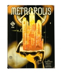 A movie poster turned wooden sign for the 1927 release of Metropolis – a German film set in a future Utopian landscape – continues to intrigue viewers today. Perfect for science fiction buffs. A movie poster turned wooden sign for the 1927 release of Metropolis – a German film set in a future Utopian landscape – continues to intrigue viewers today. Perfect for science fiction buffs.