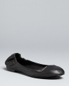 Vintage-effect metallic winged accents make these basic ballet flats soar; from Zadig & Voltaire.