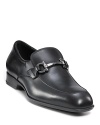 Luxe dress loafers made with supple leather, imported from Italy. Rounded toe, slip on style with gancini buckle across the foot. Leather sole with slight stack heel.