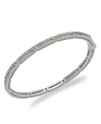 Don't set your fashion in stone. Evolve with Eliot Danori's elegant bangle bracelet, featuring a bezel setting with crystal glass accents. Crafted in rhodium-plated mixed metal. Approximate diameter: 2-1/4 inches. Don't set your fashion in stone. Evolve with Eliot Danori's elegant bangle bracelet, featuring a bezel setting with crystal glass accents. Crafted in rhodium-plated mixed metal. Approximate diameter: 2-1/4 inches.