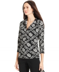 A whimsical status print makes this petite Alfani top a knockout everyday value piece! Wear with your favorite jeans or pants for a complete look. A whimsical status print makes this petite Alfani top a knockout everyday value piece! Wear with your favorite jeans or pants for a complete look.