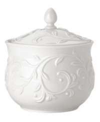 An elegant white-on-white pattern featuring an embossed vine motif and interior glaze lends the Opal Innocence Carved sugar bowl to refined dining every day. An elegant white-on-white pattern featuring an embossed vine motif and interior glaze lends the Opal Innocence Carved sugar bowl to refined dining every day.