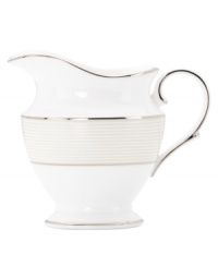 Modern yet timeless, this fine china creamer is sure to satisfy the style-hungry host. From Lenox dinnerware, the dishes from the Opal Innocence Stripe collection are simply dressed in cream and white stripes and finished with a polished platinum trim, creating an ultra-chic setting to enjoy celebratory meals. Modern yet timeless, this fine china creamer is sure to satisfy the style-hungry host. From Lenox dinnerware, the dishes from the Opal Innocence Stripe collection are simply dressed in cream and white stripes and finished with a polished platinum trim, creating an ultra-chic setting to enjoy celebratory meals.