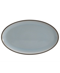 Handsome and understated, the Sienna oval platter features a glazed blue tint and mocha trim for smart-casual style with every entree. Handsome and understated, the Sienna oval platter features a glazed blue tint and mocha trim for smart-casual style with every entree.