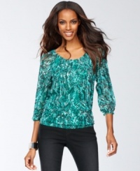 INC updates a soft peasant top silhouette with bold color and a snakeskin-inspired print for an appealing anytime casual look. INC updates a soft peasant top silhouette with bold color and a snakeskin-inspired print for an appealing anytime casual look.