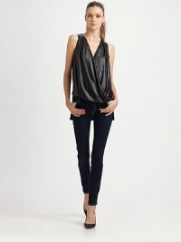 Airy georgette draped and gathered in a shapely blouson silhouette.V-neckSleevelessBlouson frontPolyesterDry cleanImportedModel shown is 5'10 (177cm) wearing US size Small. Airy georgette draped and gathered in a shapely blouson silhouette.V-neckSleevelessBlouson frontPolyesterDry cleanImportedModel shown is 5'10 (177cm) wearing US size Small.