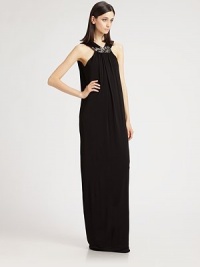 Flowing stretch jersey, tailored in a floor-length silhouette and adorned with a beaded leaf detail.Beaded V necklineSleevelessFront gathersBack VFully linedAbout 54 from natural waist97% viscose/3% elastaneDry cleanMade in ItalyModel shown is 5'11 (180cm) wearing US size 4. Flowing stretch jersey, tailored in a floor-length silhouette and adorned with a beaded leaf detail.Beaded V necklineSleevelessFront gathersBack VFully linedAbout 54 from natural waist97% viscose/3% elastaneDry cleanMade in ItalyModel shown is 5'11 (180cm) wearing US size 4.