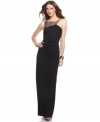 BCBGMAXAZRIA's evening gown features a sleek silhouette crowned with a sheer, asymmetrical sequined panel at the chest. An open back adds to the allure.
