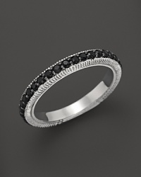 Black sapphires accent a classic sterling silver band ring from Judith Ripka. Black sapphires accent a classic sterling silver band ring from Judith Ripka.