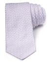 This plush silk tie balances a whimsical pattern of dots and circles with a traditional 3.5 width for a refined style that's perfect for the office or any of your dressed-up affairs.