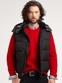 A must-have as the weather turns colder, this puffer vest features a detachable hood that packs away into an interior pocket to make travel easier.Zip frontDetachable drawstring hoodStand collarZippered side pocketsFully linedAbout 27 from shoulder to hemNylonDry cleanImported A must-have as the weather turns colder, this puffer vest features a detachable hood that packs away into an interior pocket to make travel easier.Zip frontDetachable drawstring hoodStand collarZippered side pocketsFully linedAbout 27 from shoulder to hemNylonDry cleanImported