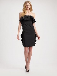 A dramatic design with oversized ruffles along the top and cascading down the back for a look that holds attention.Strapless Seam detail at the front Back zip closure Back seams About 36 from shoulder to hem 59% polyester/41% acetate Dry clean Made in Italy A dramatic design with oversized ruffles along the top and cascading down the back for a look that holds attention.Strapless Seam detail at the front Back zip closure Back seams About 36 from shoulder to hem 59% polyester/41% acetate Dry clean Made in Italy