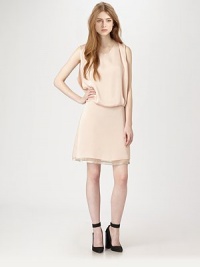 Lined in sumptuous silk, this shimmering silhouette has a blouson bodice, semi-sheer hem and partially opened back. CrewneckSleevelessSemi-sheer hemBack keyhole closureSilk liningAbout 17 from natural waistPolyesterDry cleanImportedModel shown is 5'10 (177cm) wearing US size 4. Lined in sumptuous silk, this shimmering silhouette has a blouson bodice, semi-sheer hem and partially opened back. CrewneckSleevelessSemi-sheer hemBack keyhole closureSilk liningAbout 17 from natural waistPolyesterDry cleanImportedModel shown is 5'10 (177cm) wearing US size 4.