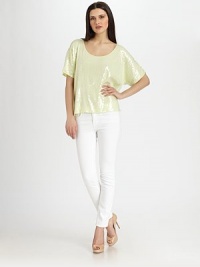 Your favorite scoopneck tee updated with glittering sequins for a study in effortless glam.ScoopneckDropped shouldersShort sleevesFlat frontAbout 22 from shoulder to hem95% rayon/5% spandexDry cleanImportedModel shown is 5'9 (175cm) wearing US size Small. Your favorite scoopneck tee updated with glittering sequins for a study in effortless glam.ScoopneckDropped shouldersShort sleevesFlat frontAbout 22 from shoulder to hem95% rayon/5% spandexDry cleanImportedModel shown is 5'9 (175cm) wearing US size Small.