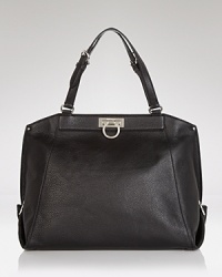 Exquisitely finished and perfectly proportioned. Salvatore Ferragamo's leather satchel with silver tone hardware is an ever-chic piece that pulls together every look. Exquisitely finished and perfectly proportioned. Salvatore Ferragamo's leather satchel with silver tone hardware is an ever-chic piece that pulls together every look.